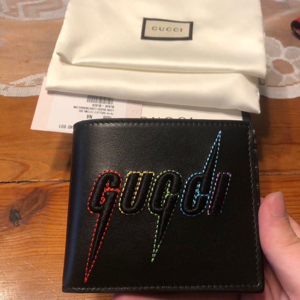 Brand new black leather Gucci wallet,